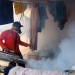 Petugas dari Dinas Kesehatan melakukan Fogging untuk membasmi nyamuk Aedes Aegipty, yang merupakan hewan pembawa penyakit DBD, di kampung Kepandean Got, Kelurahan Taktakan, Senin (14/10/2019)