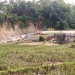 Sawah warga yang rusak diterjang air yang meluap dari Situ Pasir Ayunan.
