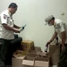 Dinas Satpol PP Kota Cilegon saat mengangkut miras hasil razia.