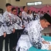 Penandatangan Hasil Pemilihan Ketua PGRI Malingping yang mengukuhkan Sanhawi menjadi Ketua. Sabtu (19/3).