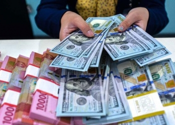 Rupiah dan Dollar AS.