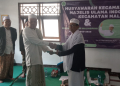 Tampak serah terima kepengurusan MUI Kecamatan Malingping dari KH Sujaya Arsudin kepada KH Idin Rosidin, bertempat di Gedung Sekretariat MUI Malingping dan dihadiri sejumlah tokoh alim ulama, Selasa (8/8)