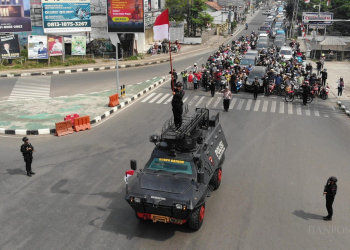 Satbrimobda Banten Laksanakan Upacara Detik-detik Proklamasi di Persimpangan Kota Serang
