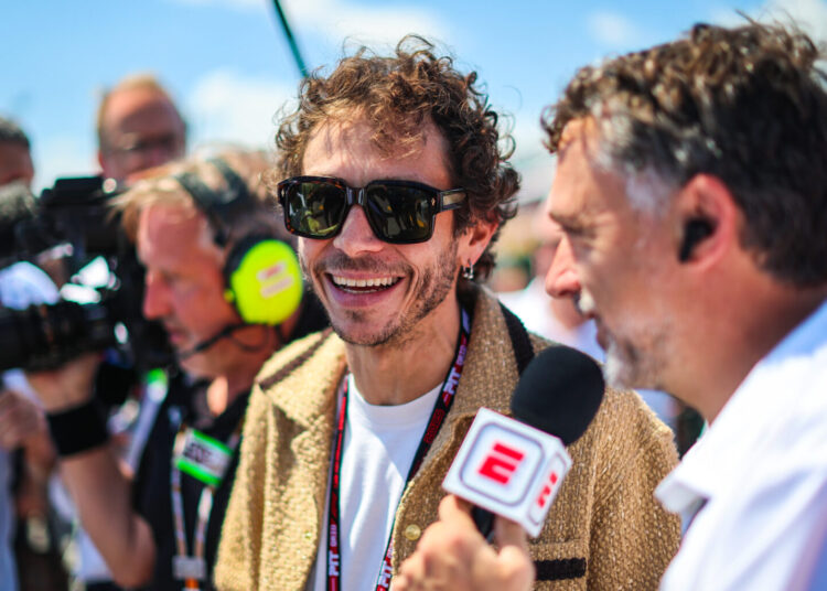 IMOLA, ITALY - MAY 18: Valentino Rossi speaks to the media on the grid during the F1 Grand Prix of Emilia-Romagna at Autodromo Internazionale Enzo e Dino Ferrari on May 18, 2025 in Imola, Italy. (Photo by Kym Illman/Getty Images)